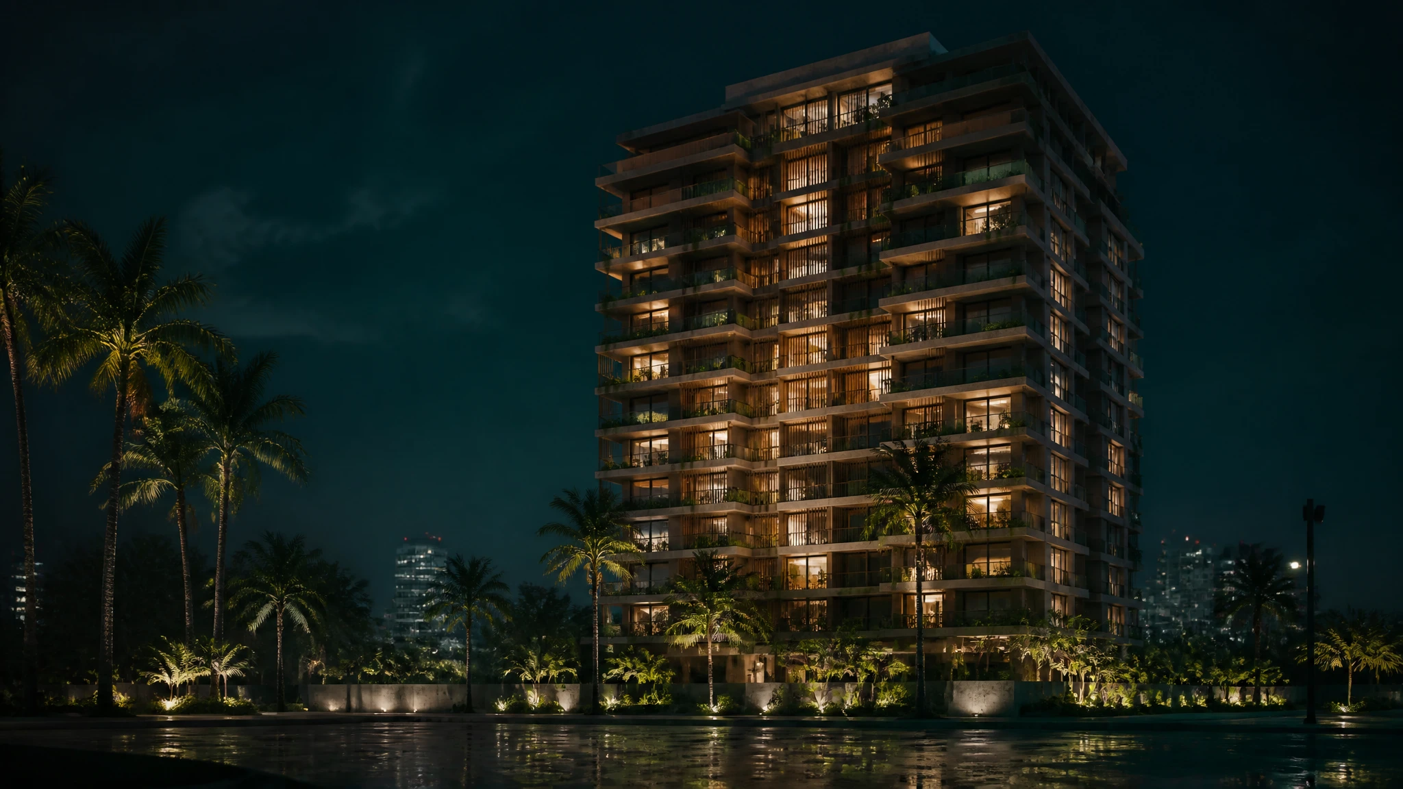 La torre de Miramar Elite iluminada de noche, con las luces cálidas de los apartamentos y palmeras en la base.